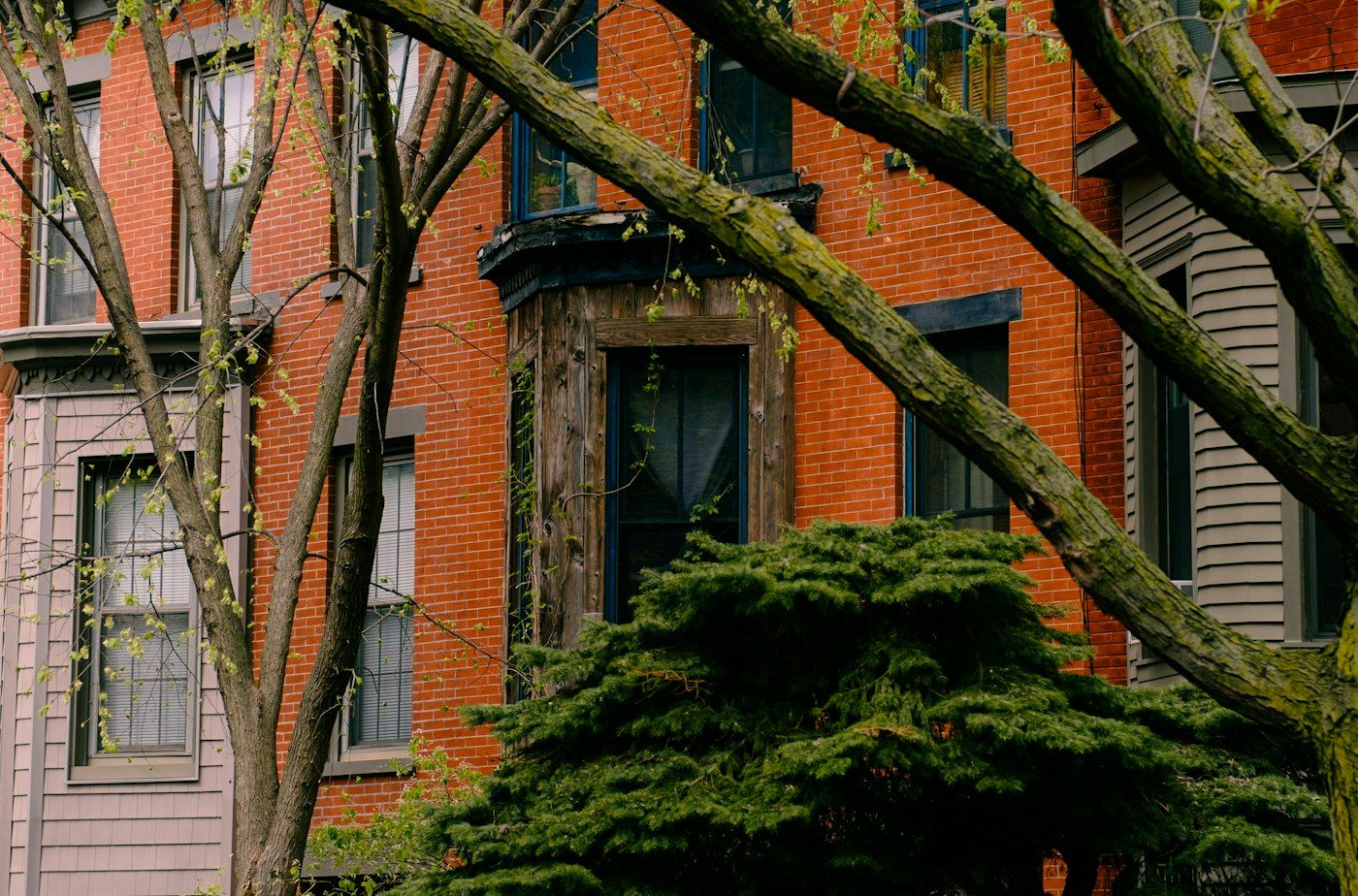 Red brick row house in Park Slope, a neighborhood where families arrange a home health aide in Brooklyn