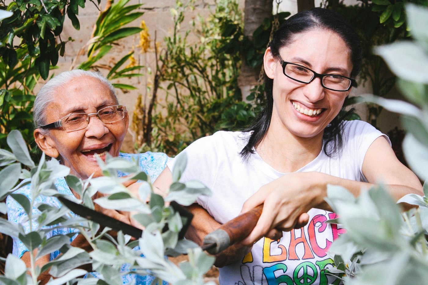 A Fadmo Health caregiver supporting a client at home under a New York Medicaid waiver