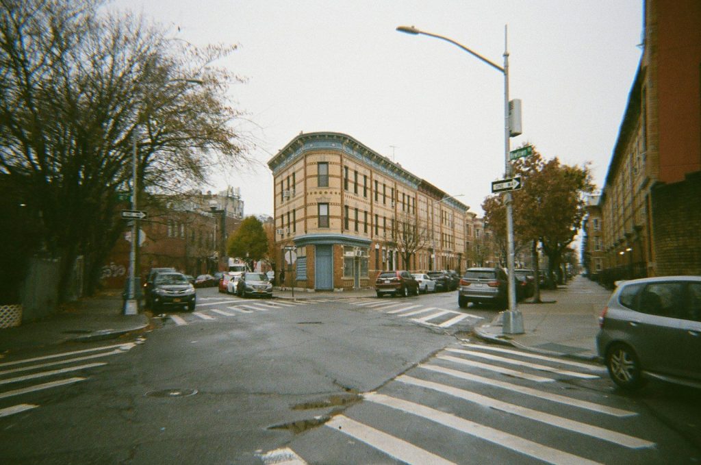 Astoria street corner, where families arrange VNS Health home care in Queens